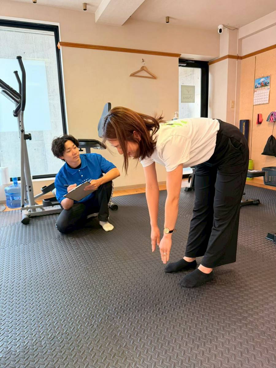 体の状態チェックの様子